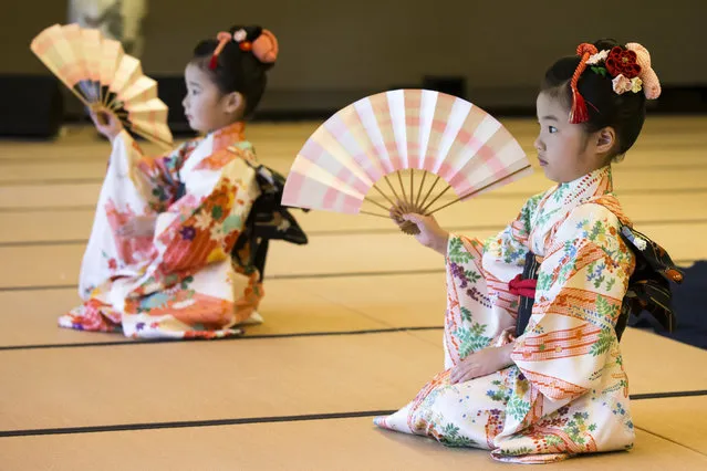 Children perform a traditional dance for U.S. first lady Melania Trump and Japanese Prime Minister Shinzo Abe's wife Akie Abe, both not pictured, during a cultural event at the Japanese style annex inside the State Guest House  in Tokyo Monday, May 27, 2019. (Photo by Tomohiro Ohsumi/Pool Photo via AP Photo)