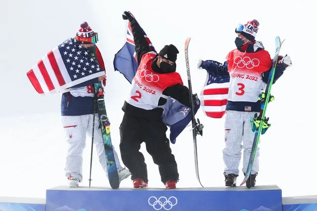 Gold medallist Nico Porteous of Team New Zealand (C), Silver medallist David Wise of Team United States (L) and Bronze medallist Alex Ferreira of Team United States (R) celebrates during the Men's Freestyle Skiing Halfpipe flower ceremony on Day 15 of the Beijing 2022 Winter Olympics at Genting Snow Park on February 19, 2022 in Zhangjiakou, China. (Photo by Maddie Meyer/Getty Images)