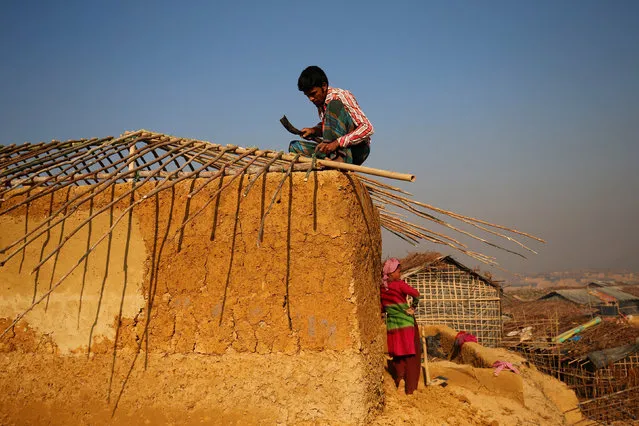 Newly arrived Rohingya refugees build a new makeshift home at Kutupalang Unregistered Refugee Camp in Cox’s Bazar, Bangladesh, February 6, 2017. (Photo by Mohammad Ponir Hossain/Reuters)
