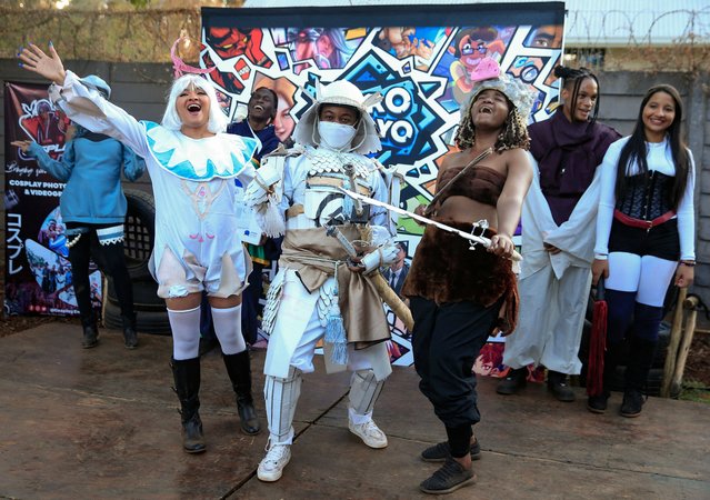 The top three cosplay winners celebrate during an anime, manga and cosplay meeting at the second Otakukon event in Harare, Zimbabwe, on August 25, 2024. (Photo by Philimon Bulawayo/Reuters)