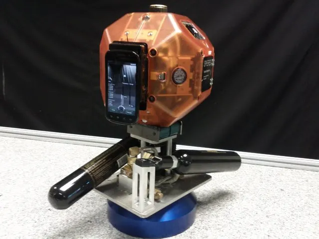 A undated handout image made available 09 July 2014 by NASA/Ames showing a prototype of free-flying space robot equipped with a smartphone, known as Smart SPHERES (Synchronized Position Hold, Engage, Reorient Experimental Satellites). NASA has been testing SPHERES on the space station since 2011. (Photo by EPA/Ames/NASA)