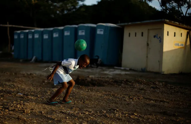 An African migrant boy plays at a temporary shelter in the La Cruz, Costa Rica, July 14, 2016. (Photo by Juan Carlos Ulate/Reuters)