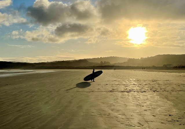 A surfer on Marble Hill beach on the north coast of Donegal, Ireland on January 2, 2025. A yellow weather and ice warning has been issued across Ireland as temperatures are set to drop to –3°C overnight. (Photo by David Young/PA Wire)