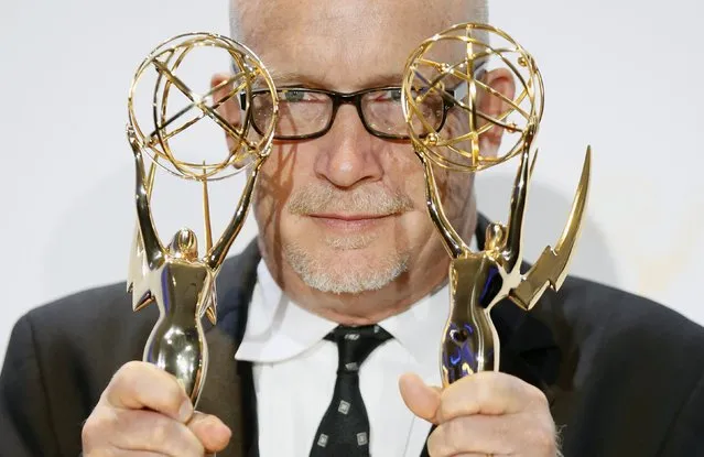 Alex Gibney poses with his outstanding nonfiction programming award and outstanding directing in a nonfiction programming award for “Going Clear: Scientology and the Prison of Belief” backstage at the 2015 Creative Arts Emmy Awards in Los Angeles, California September 12, 2015. (Photo by Danny Moloshok/Reuters)