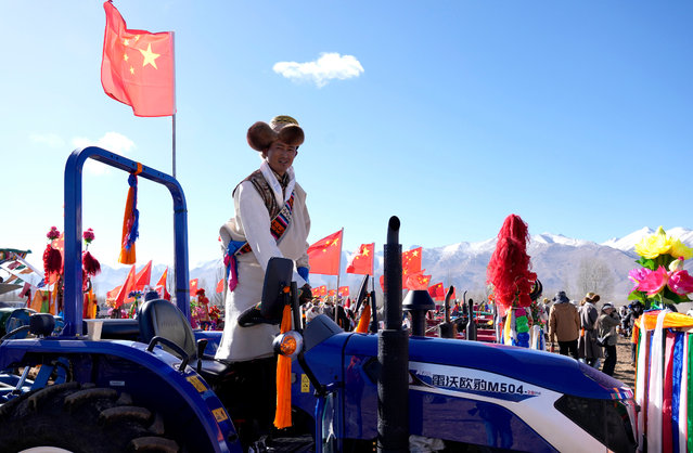 Farmers participate in a ceremony marking the start of spring farming in Codoi Township, Lhunzhub County of Lhasa, southwest China's Xizang Autonomous Region, March 16, 2025. Ceremonies marking the start of spring farming were held across Xizang on Sunday. The ceremony holds great significance as it marks the beginning of a new year's farming season and serves as a prayer for favorable weather and bountiful harvests. It is considered an important ritual in the farming regions of Xizang. (Phoot by China News Service/Getty Images)