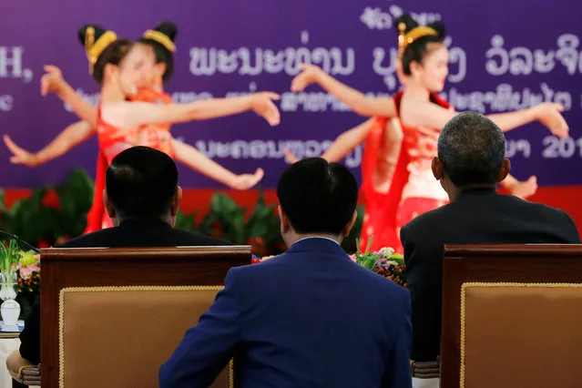 Laos President Bounnhang Vorachith (seated, L) and U.S. President Barack Obama (seated, R) watch a dance performance at a luncheon following their bilateral meeting, alongside the ASEAN Summit, at the Presidential Palace in Vientiane, Laos September 6, 2016. (Photo by Jonathan Ernst/Reuters)