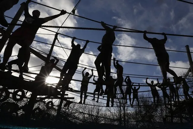 Competitors in action during the Tough Guy Challenge on January 27, 2013 in Telford, England.  (Photo by Ian Walton)