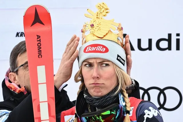 Race winner USA's Mikaela Shiffrin reacts as she is symbolically crowned on the podium after competing in the Women's Giant Slalom on January 24, 2023 in Plan de Corones (Kronplatz), Dolomites Mountains, as part of the FIS Alpine World Ski Championships. (Photo by Marco Bertorello/AFP Photo)