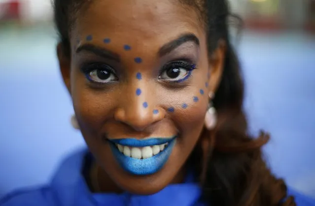 Miss Seychelles Camila Estico wears face paint during the Miss World sports competition at the Lee Valley sports complex in north London, November 26, 2014. (Photo by Andrew Winning/Reuters)