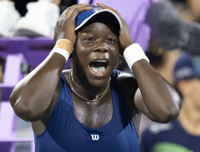 Victoria Mboko of Canada reacts following her win over Elena Rybakina of Kazakhstan during semifinal tennis action at the National Bank Open in Montreal, Wednesday, August 6, 2025. (Photo by Christinne Muschi/The Canadian Press via AP Photo)