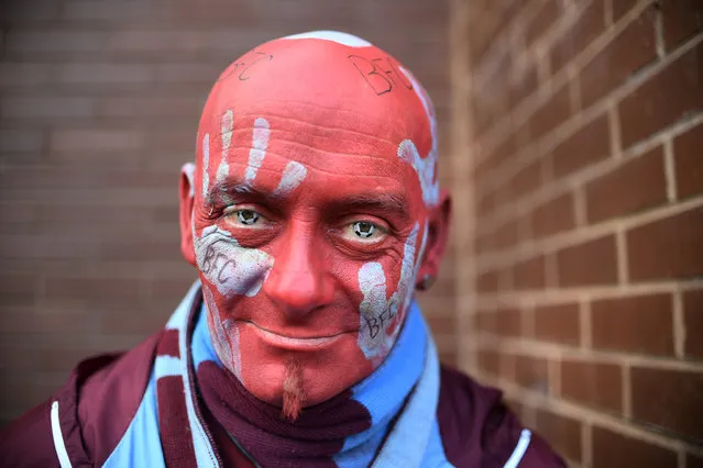 Britain Soccer Football, Burnley vs Arsenal, Premier League, Turf Moor on October 2, 2016. Burnley fan poses outside the stadium before the match. (Photo by Anthony Devlin/Reuters/Livepic)