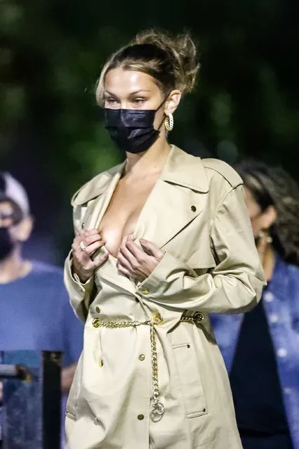 American model Bella Hadid almost had a wardrobe malfunction as she spilled out of her outfit and showed off some major cleavage. The supermodel was spotted in New York City on October 16, 2020, and she made sure to turn some heads with her attire. (Photo by Backgrid USA)