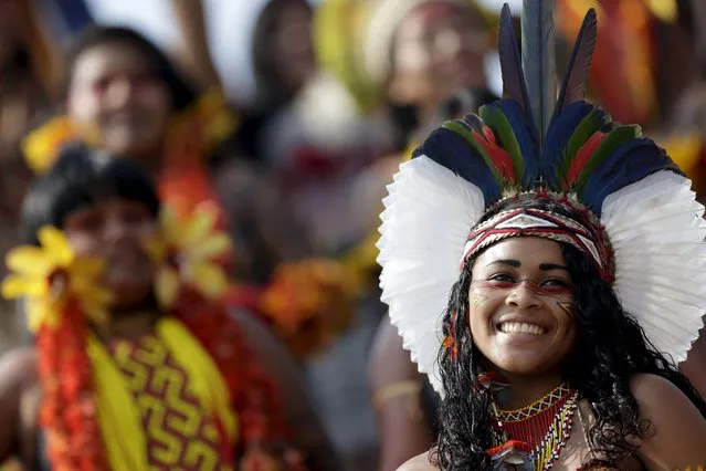 An indigenous woman from Pataxo tribe poses for photos after participating in a parade of indigenous beauty during the first World Games for Indigenous Peoples in Palmas, Brazil, October 29, 2015. (Photo by Ueslei Marcelino/Reuters)
