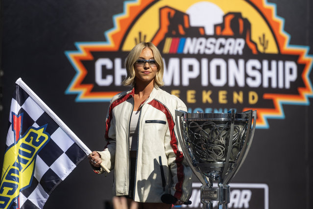 Actress Sydney Sweeney brings out the checkered flag prior to the NASCAR Cup Series Championship race at Phoenix Raceway in Avondale, Arizona on November 2, 2025. (Photo by Mark J. Rebilas/Reuters)