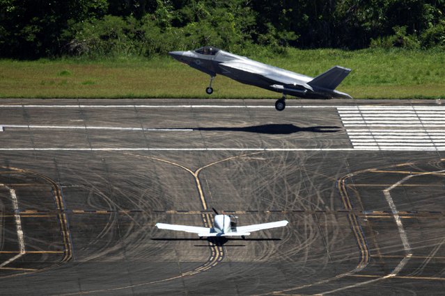 A U.S. Marine Corps F-35 fighter jet lands as a private airplane holds on the taxiway at the former Roosevelt Roads military base in Ceiba, Puerto Rico on September 17, 2025. (Photo by Ricardo Arduengo/Reuters)