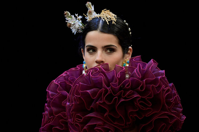 A model presents a creation by Isabel Japon during the Simof 2025 (International Flamenco Fashion Show) in Seville on January 31, 2025. (Photo by Cristina Quicler/AFP Photo)
