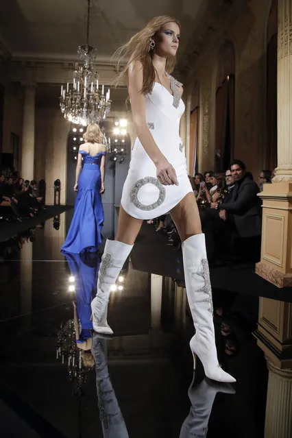 A model presents a creation by Italian fashion designer Donatella Versace as part of the Atelier Versace Spring-Summer 2015 Haute Couture fashion collection presented in Paris, France, Sunday, January 25, 2015. (Photo by Francois Mori/AP Photo)