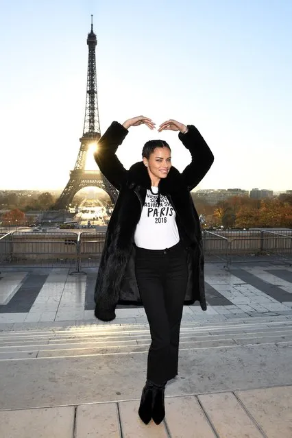 Adriana Lima poses in front of the Eiffel Tower prior the 2016 Victoria's Secret Fashion Show on November 29, 2016 in Paris, France. (Photo by Dimitrios Kambouris/Getty Images for Victoria's Secret)