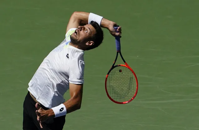 Bernabe Zapata Miralles of Spain serves to Novak Djokovic of Serbia during their Men's Singles match at the 2023 US Open Tennis tournament at the USTA Billie Jean King National Tennis Center in New York on August 30, 2023. (Photo by Timothy A. Clary/AFP Photo)