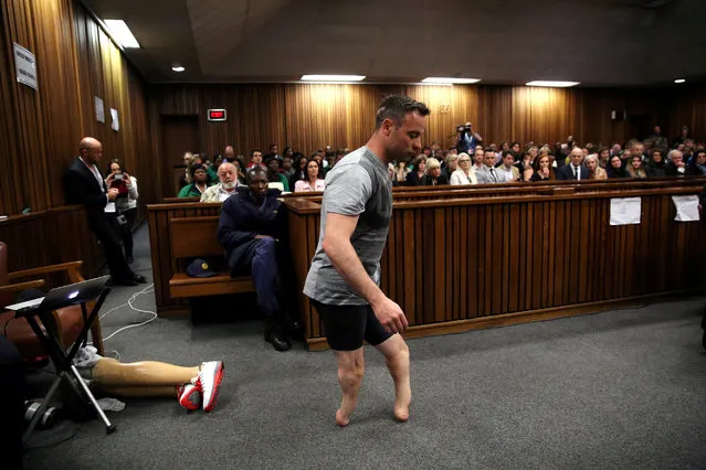 Paralympic gold medalist Oscar Pistorius walks across the courtroom without his prosthetic legs during the third day of the resentencing hearing for the 2013 murder of his girlfriend Reeva Steenkamp, at Pretoria High Court, South Africa June 15, 2016. (Photo by Siphiwe Sibeko/Reuters)