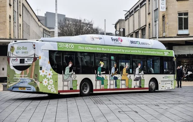 Britain's first “poo bus”, which runs on human and household waste, goes on display to the public so they can get up close an personal with the eco-friendly vehicle in Bristol on March 17, 2015. Powered by biomethane gas, the Bio-Bus will use waste from more than 32,000 households along its 15-mile route. Operated by bus company First West of England, the bus will fill up at a site in Avonmouth, Bristol, where sewage and inedible food waste is turned into biomethane gas. (Photo by Ben Birchall/PA Wire)