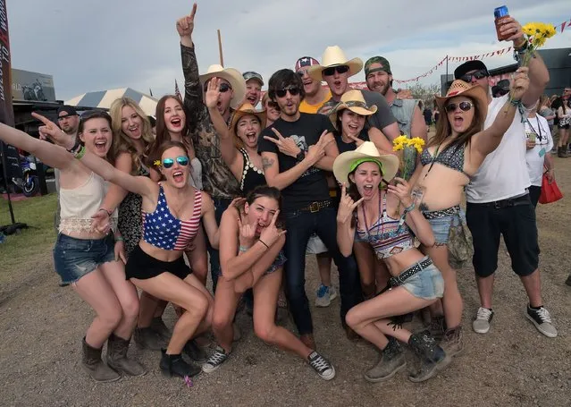 Singer/Songwriter Chris Janson (center black shirt) with fans during Country Thunder USA – Day 3 on April 11, 2015 in Florence, Arizona. (Photo by Rick Diamond/Getty Images for Country Thunder USA)