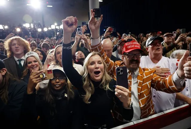 Supporters of former President Donald Trump celebrate at his caucus night event at the Iowa Events Center on January 15, 2024 in Des Moines, Iowa. Iowans voted today in the state’s caucuses for the first contest in the 2024 Republican presidential nominating process. Trump has been projected winner of the Iowa caucus. (Photo by Chip Somodevilla/Getty Images)