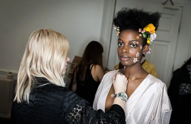 A model backstage ahead of the Tata Naka show during the London Fashion Week February 2017 collections at the ICA on February 21, 2017 in London, England. (Photo by Tim P. Whitby/Getty Images)