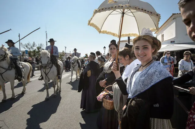 Gypsies pictured during a procession with the sculpture of “Sara the Black” to the sea on May 24, 2016 in Staintes Maries de la Mere near Arles, France. (Photo by Thomas Lohnes/Getty Images)