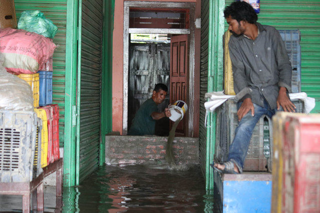 A house is inundated after heavy rains in Kathmandu, Nepal, August 6, 2024. (Photo by Xinhua News Agency/Rex Features/Shutterstock)