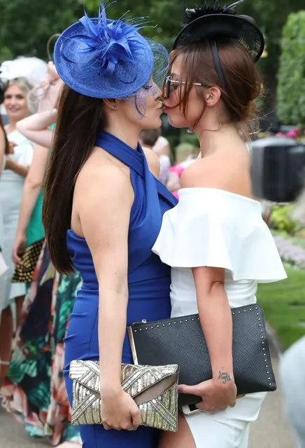 Two women shared a smooch on Ladies’ Day as they donned their best hats at Royal Ascot 2017 at Ascot Racecourse on June 22, 2017 in Ascot, England. (Photo by Rex Features/Shutterstock)