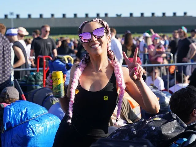 People queue for entry on the first day of the Glastonbury Festival at Worthy Farm in Somerset, United Kingdom on Wednesday, June 22, 2022. (Photo by Yui Mok/PA Images via Getty Images)