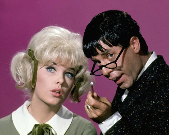 Stella Stevens, US actress, and Jerry Lewis, US actor and comedian, in a publicity image issued for the film, “The Nutty Professor”, USA, 1963. The comedy, directed by Jerry Lewis, starred Lewis as “Professor Julius Kelp” and Stevens as “Stella Purdy”. (Photo by Silver Screen Collection/Getty Images)