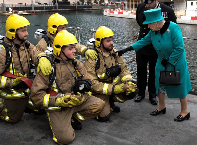 Britain's Queen Elizabeth II visits HMS Sutherland in the West India Dock, London, Britain October 23, 2017. (Photo by Arthur Edwards/Reuters)