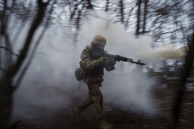 A Ukrainian serviceman of 24th Mechanized brigade trains at the polygon not far from frontline in Donetsk region, Ukraine, Tuesday January 21, 2024. (Photo by Evgeniy Maloletka/AP Photo)