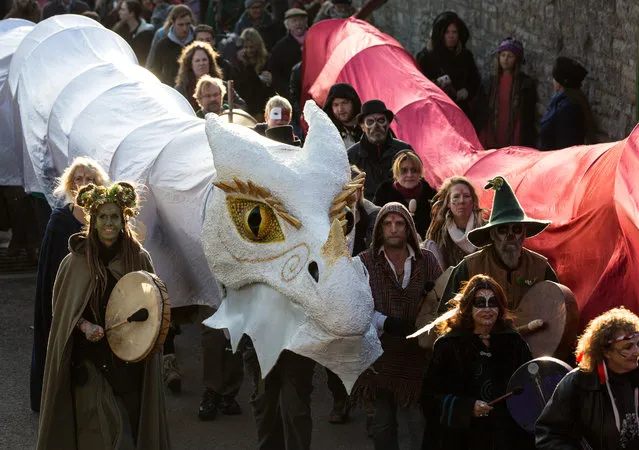 The Glastonbury Dragons are paraded through the town as they celebrate Samhain at the Glastonbury Dragons Samhain Wild Hunt 2017 in Glastonbury on November 4, 2017 in Somerset, England. (Photo by Matt Cardy/Getty Images)