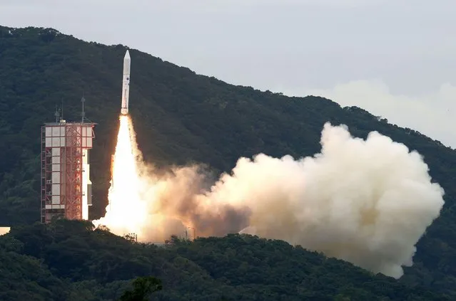 The Epsilon-6 rocket blasts off from the Uchinoura Space Center in Kimotsuki town, Kagoshima prefecture, southern Japan Wednesday, October 12, 2022. The Japanese space agency said its rocket failed just after liftoff Wednesday and had to be aborted by a self-destruction command, in the country’s first failed rocket launch in nearly 20 years. (Photo by Kyodo News via AP Photo)