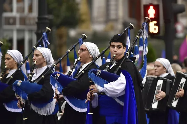 Musicians perform before the 2022 Princess of Asturias Awards ceremony in Oviedo, northern Spain, Friday, October 28, 2022. The awards, named after the heir to the Spanish throne, are among the most important in the Spanish-speaking world. (Photo by Alvaro Barrientos/AP Photo)