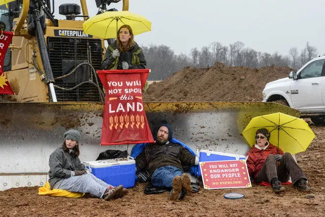 Members of a group called Lancaster Against Pipelines block construction of a pipeline in Holtwood, Pennsylvania, U.S. November 18, 2017. (Photo by Stephanie Keith/Reuters)