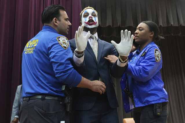 Paperboy Prince is removed from the New York City Mayoral Candidates Forum at Medgar Evers College Wednesday, April 23, 2025, in New York. (Photo by Frank Franklin II/AP Photo)