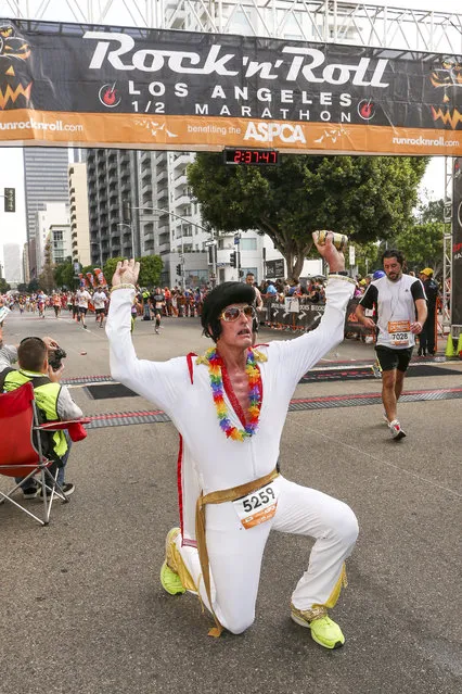 General view of a runner at the finish line at the Rock 'n' Roll Los Angeles Halloween Half-Marathon and 5K benefitting the ASPCA on October 26, 2014 in Los Angeles, California. (Photo by Rich Polk/Getty Images for CGI)