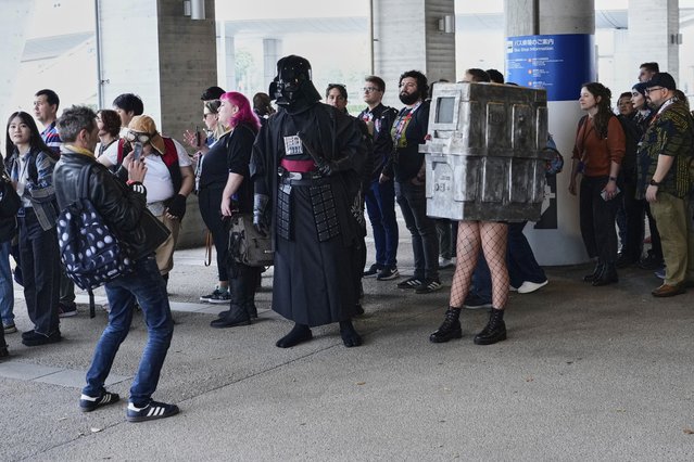 People line up to enter the Makuhari Messe convention center for the Star Wars Celebration Japan in Chiba, near Tokyo, Friday, April 18, 2025. (Photo by Hiro Komae/AP Photo)