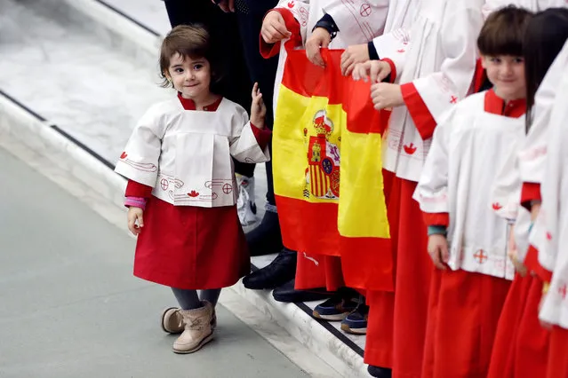 Children attend the weekly general audience with Pope Francis (not pictured) at the Vatican on December 7, 2022. (Photo by Remo Casilli/Reuters)