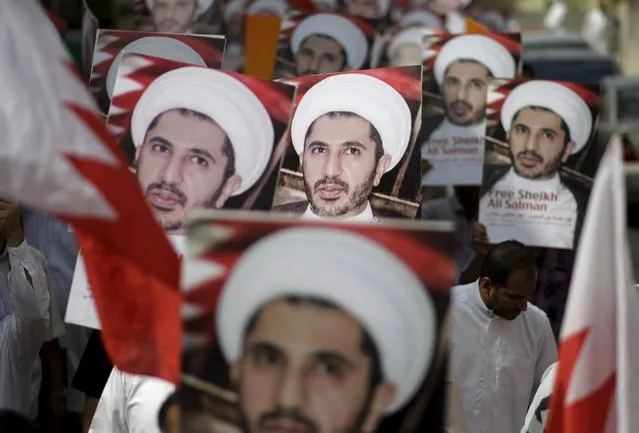 Protesters hold placards depicting photos of opposition leader and head of al-Wefaq party Sheikh Ali Salman during a protest after Friday prayers in the village of Diraz, west of Manama, Bahrain, October 9, 2015. Hundreds of protesters shouting anti-government slogans on Friday asked for the release of opposition leader Salman, who was sentenced in June to four years in jail by a Bahraini court. (Photo by Hamad I Mohammed/Reuters)