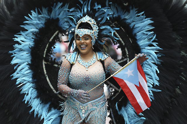 Performers make their way down Fifth Avenue during the Puerto Rican Day Parade, Sunday, June 8, 2025, in New York. (Photo by Heather Khalifa/AP Photo)