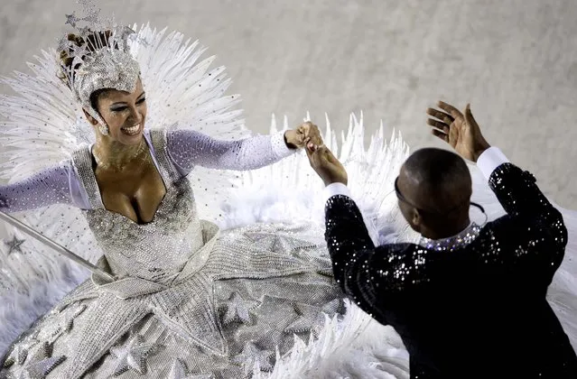 Performers from the Academicos do Salgueiro samba school dance during carnival celebrations at the Sambadrome in Rio de Janeiro. (Photo by Felipe Dana/Associated Press)