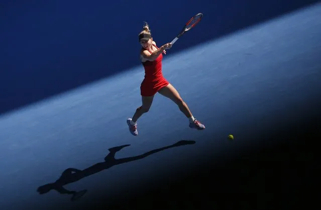 Romania' s Simona Halep hits a return against Germany' s Angelique Kerber during their women' s singles semi- finals match on day 11 of the Australian Open tennis tournament in Melbourne on January 25, 2018. (Photo by Toru Hanai/Reuters)