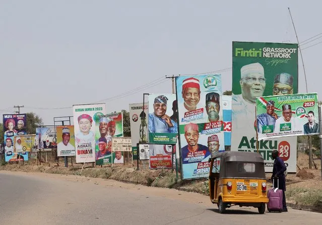 Electoral campaign posters are seen in Numan road, ahead of Nigeria's Presidential elections, in Yola, Nigeria on February 23, 2023. (Photo by Esa Alexander/Reuters)