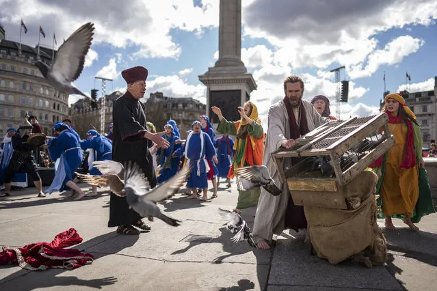 The Passion of Jesus is performed to crowds in Trafalgar Square, London, Friday, April 7, 2023 on Good Friday by actors from the Wintershall Players. (Photo by Aaron Chown/PA Wire via AP Photo)