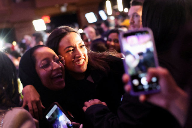 U.S. Representative Alexandria Ocasio-Cortez celebrates with supporters as initial projections show Zohran Mamdani winning on November 5, 2025. (Photo by Shannon Stapleton/Reuters)
